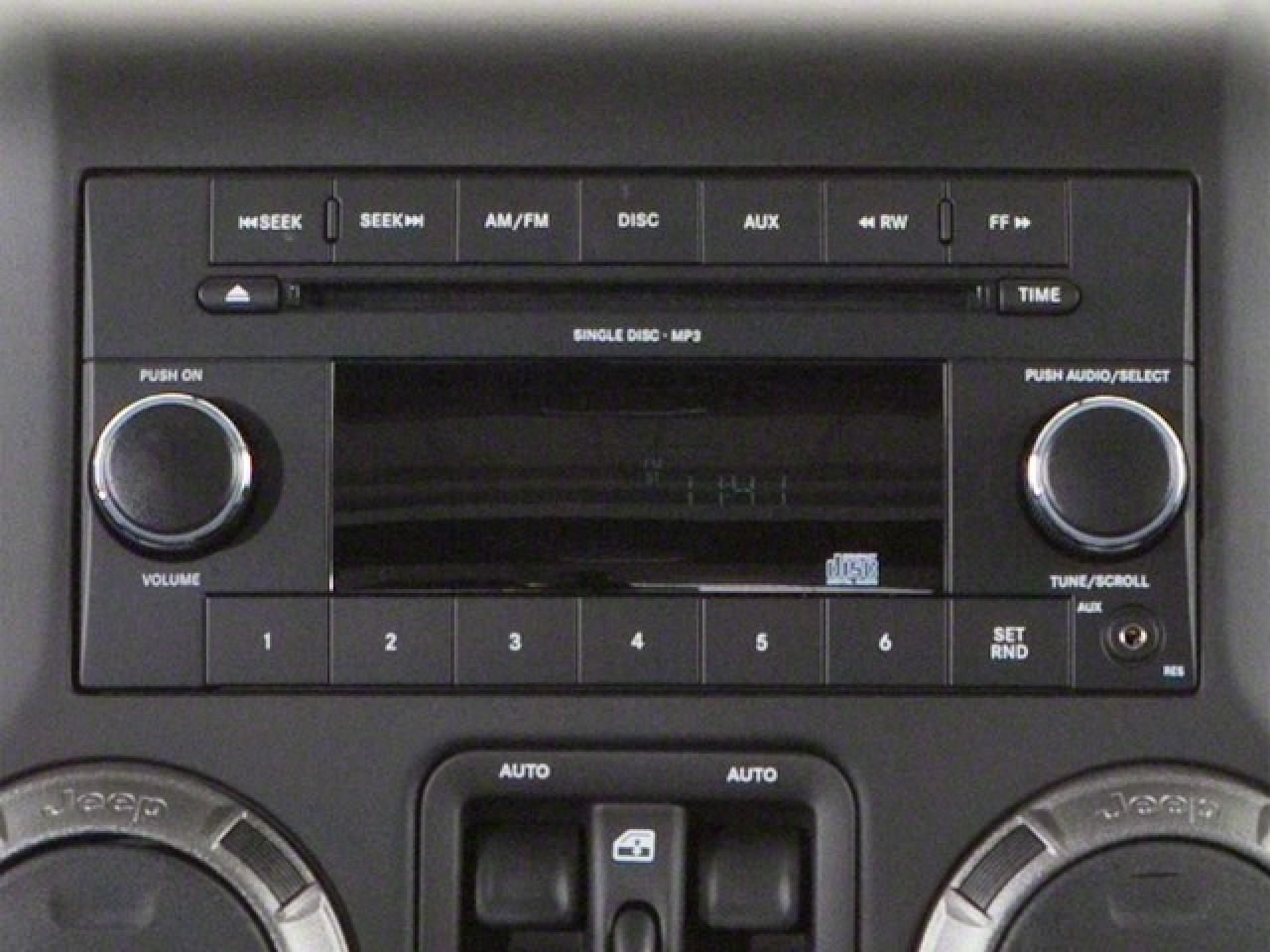 2012 Jeep WRANGLER UNLIMITED 4WD 4dr Sahara Photo