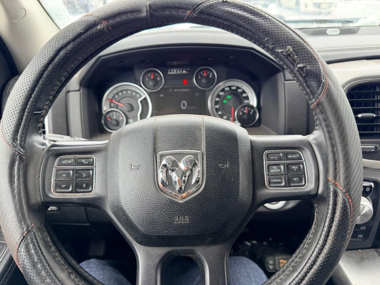 2017 RAM 1500 4WD Quad Cab 140.5  Sport Photo