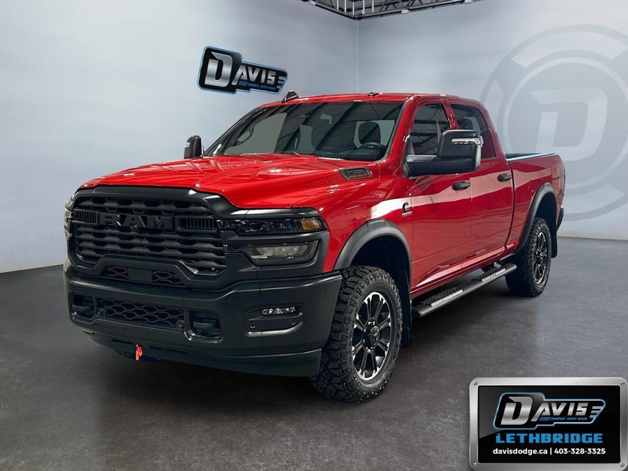<p>The <strong>2026 Ram 2500 Warlock 4x4 Crew Cab</strong> in vibrant red is a powerful truck engineered to tackle tough terrains with ease. Equipped with a robust 4x4 drivetrain and designed for ultimate performance and handling challenges, this truck is ready for your next adventure.</p><p><strong>Interior Features:</strong></p><ul><li>Plush black interior providing comfort and style</li><li>Uconnect 5 Nav with a large 12.0" touchscreen display for seamless control</li><li>Smart device integration with Bluetooth and a Wi-Fi hotspot for connectivity on-the-go</li><li>A/C with dual-zone auto temperature control for a personalized climate</li><li>Adaptive Cruise Control for a more relaxed drive</li><li>SiriusXM with on-demand content for entertainment</li></ul><p><strong>Exterior Features:</strong></p><ul><li>Flame Red exterior with striking Warlock decals</li><li>Robust bed utility group featuring a MOPAR spray-in bedliner and LED bed lighting</li><li>18" steel spare wheel and black wheel flares enhancing the rugged appeal</li><li>Power heated folding telescopic mirrors with turn signals and courtesy lamps</li><li>Hill Descent Control and tow prep group for enhanced towing and off-road capabilities</li></ul><p><strong>Technology & Safety Features:</strong></p><ul><li>12" Touchscreen display with GPS navigation for easy trips</li><li>Park-Sense front and rear park assist ensuring effortless parking</li><li>Emergency Vehicle Alert System (EVAS) for increased safety</li><li>Heavy-duty engine cooling paired with a diesel exhaust brake for reliability under load</li><li>Select accessories such as Alexa Built-in and off-road information pages for seamless technology access</li></ul><p>This Ram 2500 is an excellent choice for those seeking a dependable and well-equipped truck, whether its for work or adventurous off-road excursions. Contact Davis Dodge Lethbridge today for more details about this incredible vehicle or to schedule a test drive!</p>