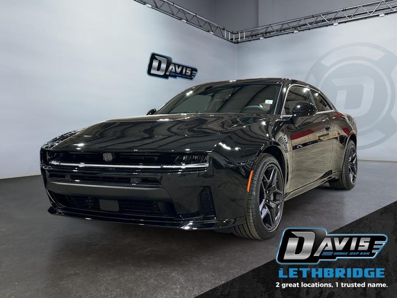 <b>Adaptive Cruise, Line Lock, Launch Control, 18 Speaker Alpine Sound System</b><br /> <br /> <br />The 2026 Dodge Charger Scat Pack 2-Door AWD brings a bold new chapter to Dodge muscle, combining aggressive coupe styling with advanced performance engineering. Finished in Diamond Black Crystal Pearl, it features Scat Pack badging, a functional performance hood with heat extractors, black exterior accents, LED lighting, and a rear performance spoiler that gives it a powerful, unmistakable road presence.<br /><br />Power comes from a 3.0L Twin-Turbo Sixpack High-Output engine paired with an 8-speed automatic transmission and all-wheel drive, delivering strong acceleration with confident traction in all driving conditions. Performance-focused hardware such as an active exhaust, launch control, line lock, mechanical limited-slip differential, and performance suspension and brakes make this Charger Scat Pack as capable on the street as it is thrilling to drive.<br /><br />Inside, the driver-centric cabin blends comfort and cutting-edge technology with heated and ventilated front seats, a flat-top performance steering wheel with paddle shifters, and a fully digital cockpit. Features include Uconnect 5 NAV with a 12.3-inch touchscreen, head-up display, wireless Apple CarPlay and Android Auto, wireless charging, an Alpine 18-speaker premium audio system, and advanced safety technologies like adaptive cruise control, surround-view camera, blind spot monitoring, and active lane management. This Charger Scat Pack delivers modern muscle with everyday refinement and innovation.<br /> <br />To apply right now for financing use this link: <a href=https://lethbridge.davisdodge.ca/free-credit-check/ target=_blank rel=nofollow noopener noreferrer>https://lethbridge.davisdodge.ca/free-credit-check/</a><br /><br /> <br /><br />As a premier Chrysler, Dodge, Jeep and RAM dealership, Davis Dodge proudly offers an extensive selection of new and used vehicles to meet every drivers needs. Customers across Lethbridge, Fort Macleod, Taber, Claresholm, Coaldale, and beyond trust us for daily vehicle specials, certified service and parts, and a seamless online inventory experience. <br /><br /> With competitive financing options and expert support, we make car buying easy and enjoyable. <br /><br /> Ready to hit the road? Schedule your test drive today at Davis Dodge, your trusted Chrysler, Dodge, Jeep and RAM dealer in Lethbridge, Alberta.<br /><br /> Vehicle pricing offer shown expires 2026-04-30. <br /> Come by and check out our fleet of 70+ used cars and trucks and 110+ new cars and trucks for sale in Lethbridge. o~o
