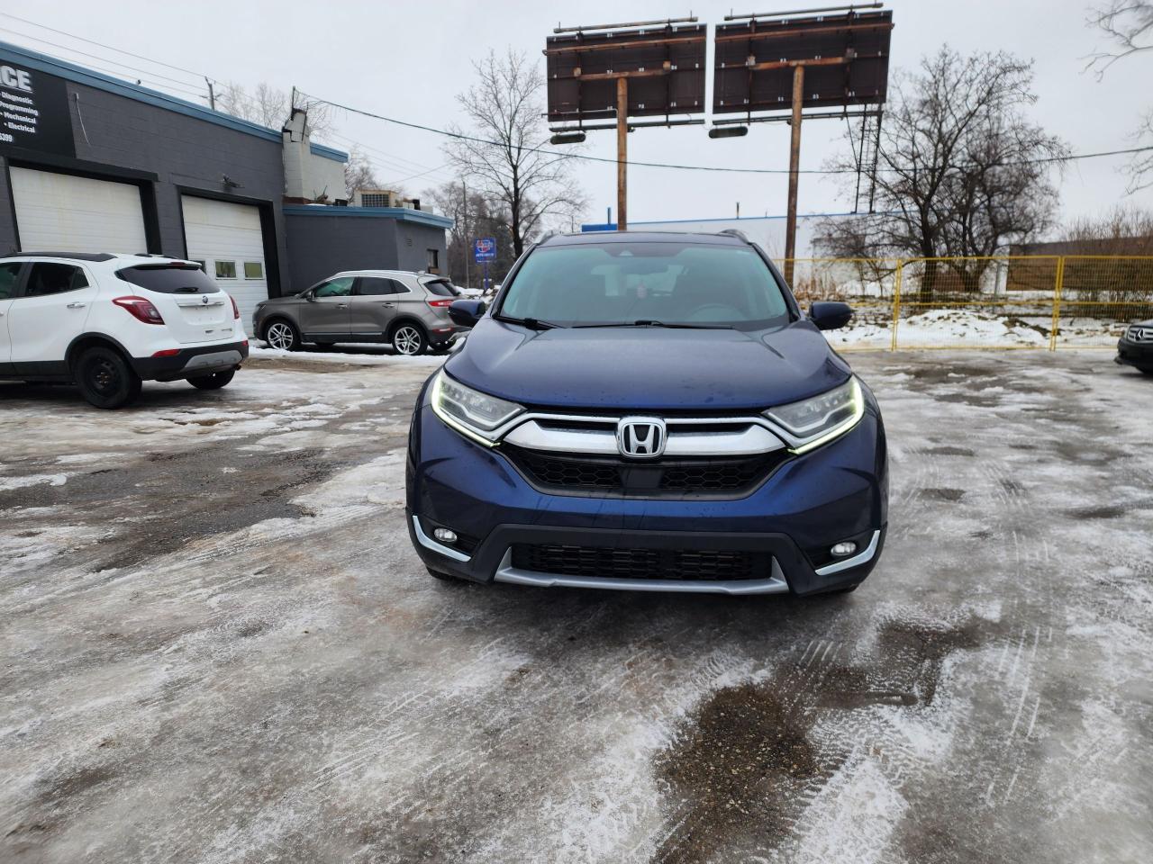 2018 Honda CR-V Touring l Clean Carfax l AWD l Heated Seats l Photo