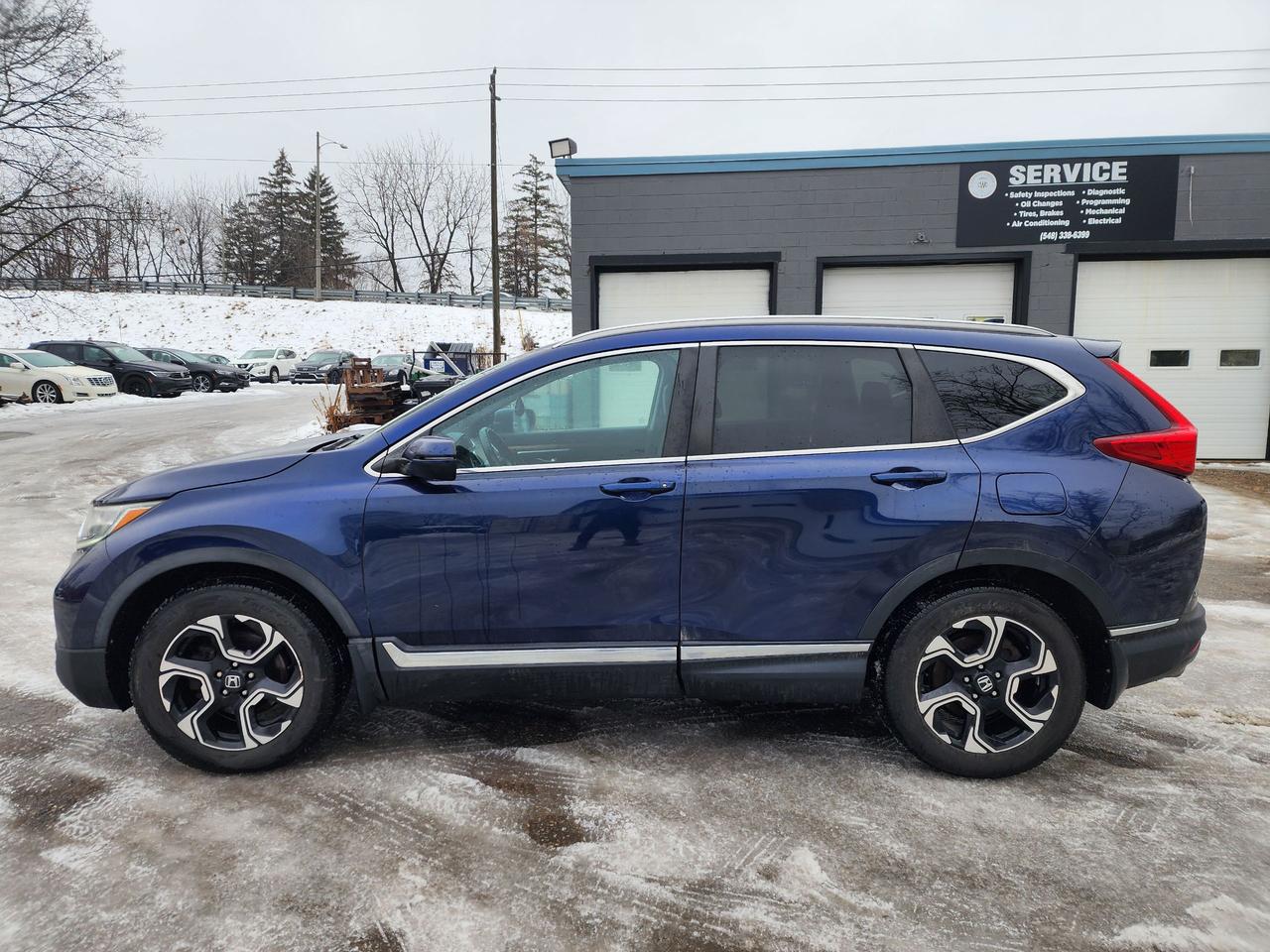 2018 Honda CR-V Touring l Clean Carfax l AWD l Heated Seats l Photo