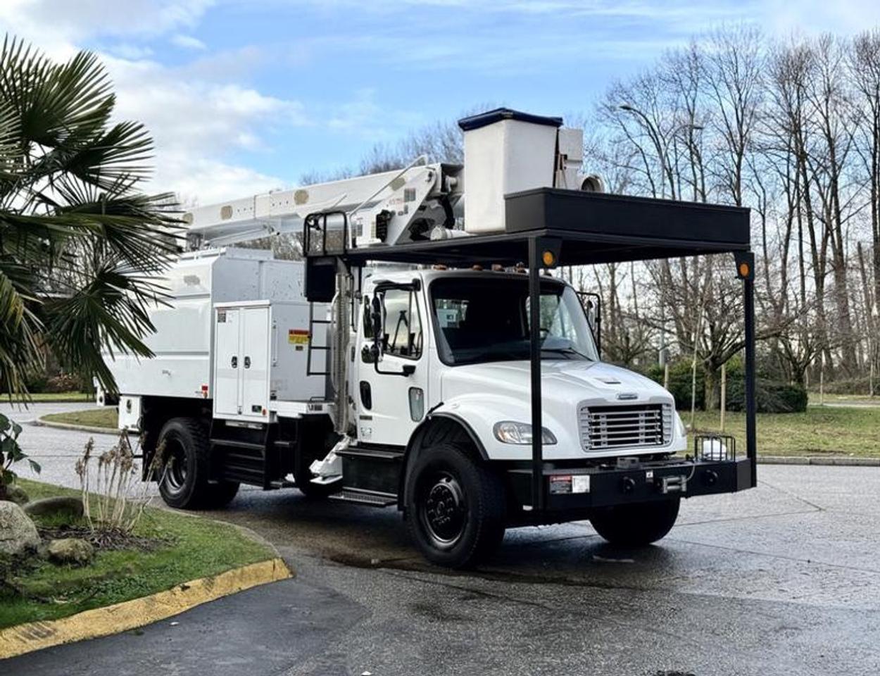 This 2015 Freightliner M2 106 bucket truck is powered by a 6.7L Cummins diesel engine paired with an automatic transmission and 4x2 drivetrain. It is equipped with an Altec LR760 bucket lift offering a 60-foot platform height and a 400 lb platform capacity, supported by outriggers for stable operation. The truck features a PTO-driven hydraulic system, rear differential lock, air brakes, air down suspension, and a 15,000 lb winch, along with an emergency shutdown switch and battery night switch. The rear includes a 10-foot dump box measuring approximately 6 ft 6 in wide and 4 ft 9 in high, with storage compartments integrated throughout the body. Additional cab features include air conditioning and heat, AM/FM radio with CD player, and cloth seating. Overall vehicle dimensions are approximately 33 ft 9 in long, 8 ft 4 in wide, and 13 ft 3 in high, with a GVWR of 17,055 kg (37,600 lb), making it well suited for utility, electrical, municipal, and service applications. This item is currently OFFSITE. You must register an appointment with our office to schedule an offsite viewing. Appointments must be made a minimum of one business day in advance (and as defined by the days that Repo.com is open for business) before your appointment can be scheduled and confirmed. We may, at our own discretion, instead opt to transport smaller items to Repo.coms main yard for viewing purposes.  $148,880.00 plus $375 processing fee, $149,255.00 total payment obligation before taxes.  Listing report, warranty, contract commitment cancellation fee, financing available on approved credit (some limitations and exceptions may apply). All above specifications and information is considered to be accurate but is not guaranteed and no opinion or advice is given as to whether this item should be purchased. We do not allow test drives due to theft, fraud, acts of vandalism and undetectable impaired driving. Instead we provide the following benefits: Complimentary Warranty (with options to extend), Limited Money Back Satisfaction Guarantee on Fully Completed Contracts, Contract Commitment Cancellation, and an Open-Ended Sell-Back Option. Ask seller for details or call 604-522-REPO(7376) to confirm listing availability.