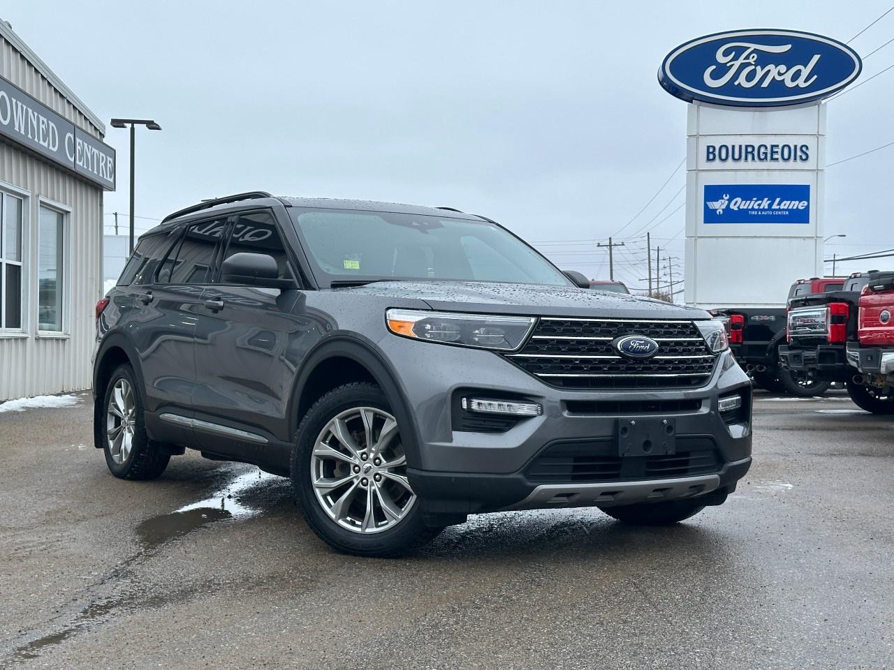<p>The 2021 Ford Explorer XLT 4WD in a sophisticated gray finish with a dynamic 4×4 drivetrain offers exceptional handling and versatility, perfect for those rugged Canadian trails and smooth urban roads alike.</p><p>The Explorer's exterior boasts modern lines and a commanding presence, while the interior invites you in with comfortable black seating. The blend of functionality and style is evident with its alloy wheels and sleek body design, complemented by practical features such as heated mirrors and power seats.</p><p>Technology meets comfort in this SUV, highlighted by a panoramic moonroof that enhances the driving experience. Stay connected and entertained with smart device integration and a built-in Wi-Fi hotspot. Safety is paramount with features including a backup camera, lane-assist, and parking sensors, ensuring every drive is as secure as it is pleasurable.</p><p>For adventurous families and tech-savvy individuals seeking a reliable vehicle that doesn't compromise on style or innovation, the Ford Explorer XLT 4WD hits all the right marks. Contact our dealership today to learn more about this exceptional SUV and experience its sophisticated features firsthand.</p>