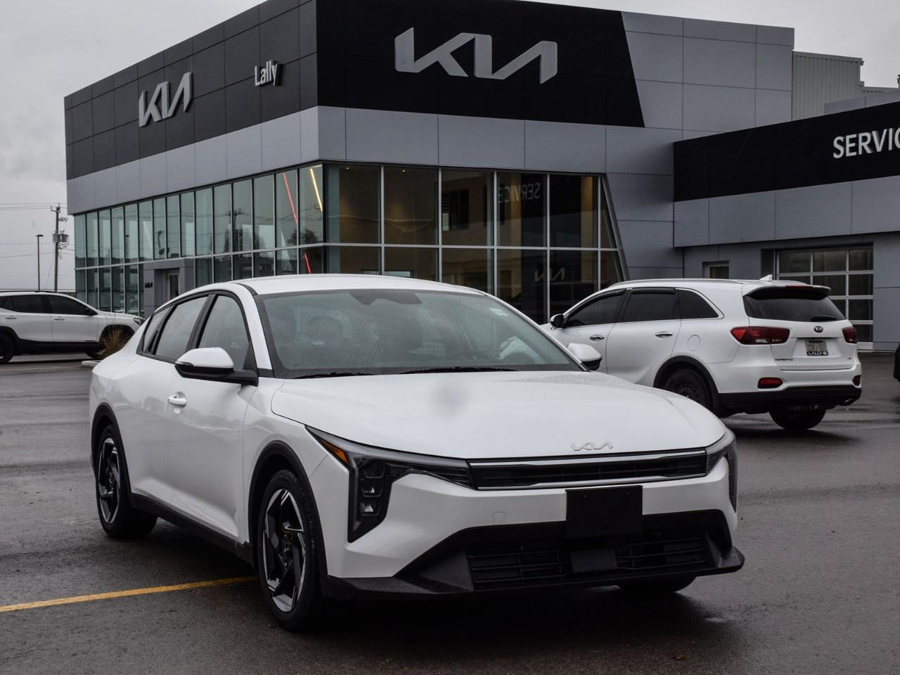 <h3><strong>2026 Kia K4  EX  Stock #LKFR00553</strong></h3><p>The <strong>2026 Kia K4 EX Sedan</strong> offers a well-rounded blend of comfort, efficiency, and modern technology in a stylish compact package. With its smooth automatic transmission and front-wheel drive, the K4 EX delivers a composed and confident ride for city streets, highways, and everything in between.</p><p>Inside, the cabin is thoughtfully equipped with <strong>heated front seats</strong> and a <strong>heated steering wheel</strong>, ensuring comfort during cooler Canadian mornings. The interior provides ample passenger space and a practical trunk, making it a versatile option for both daily commuting and weekend adventures.</p><p>Stay connected with the user-friendly touchscreen infotainment system featuring <strong>Apple CarPlay and Android Auto</strong>, keeping navigation, calls, and entertainment easily accessible. Standard driver-assist technologies provide an added layer of confidence on the road, while alloy wheels wrapped in all-season <strong>tires</strong> complete the K4s refined exterior look.</p><p>With its combination of comfort, technology, and practicality, the <strong>2026 Kia K4 EX Sedan</strong> is a smart choice for drivers seeking a reliable and modern compact sedan.</p><p><strong>Call us today for the latest incentives from Kia Canada!</strong></p> <p>OnRoads: Deductible coverage + Windshield chip coverage + theft/recovery benefit policy. Mats/Wheel locks</p>