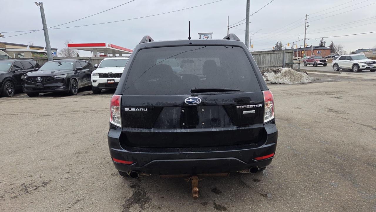 2010 Subaru Forester X Photo3