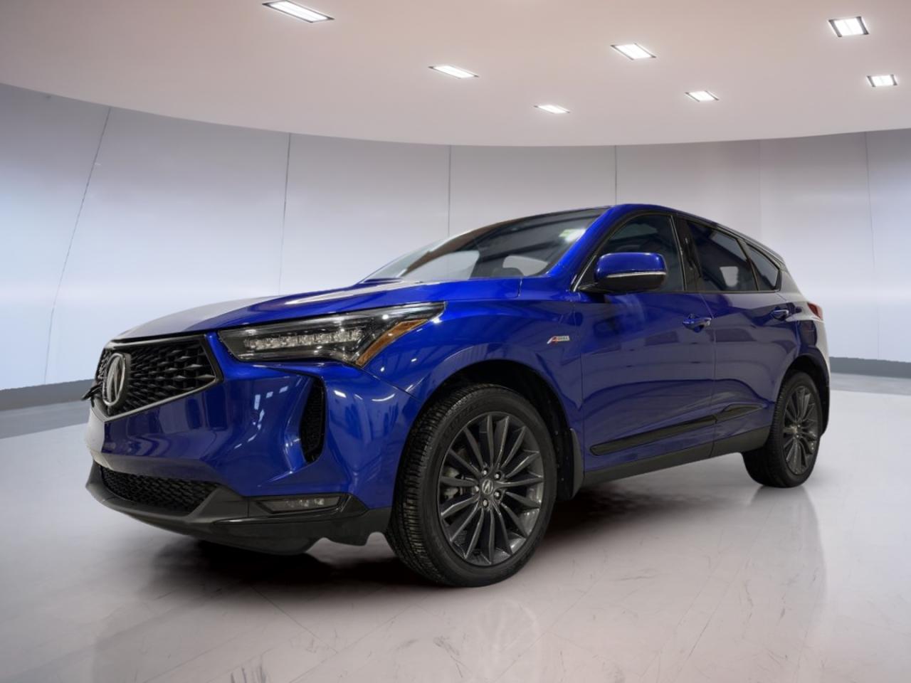 Experience refined performance and premium comfort with the 2023 Acura RDX Platinum Elite A, now available at Moose Jaw Honda in Moose Jaw. This used SUV stands out with its bold blue exterior and sleek black interior, offering a sophisticated driving experience. With only 38,058 km on the odometer, it blends reliability and modern style for Canadian roads. The 2.0L 16V DOHC 4-Cylinder VTEC Turbocharged engine and 10-speed automatic transmission deliver a dynamic yet efficient drive, while all-wheel drive ensures confidence in all conditions.

FEATURES OF THE RDX Platinum Elite A  
»» 2.0L VTEC Turbocharged 4-cylinder engine  
»» 10-speed automatic transmission with grade logic  
»» All-wheel drive for enhanced traction  
»» Premium exterior and interior colour combination  

ADVANCED SAFETY FEATURES  
»» Comprehensive airbag system for occupant protection  
»» Advanced traction control for stable handling  
»» Anti-lock braking system for safer stops  
»» Rearview camera for parking assistance  

PERFORMANCE AND EFFICIENCY  
»» 2.0L turbocharged engine for responsive power  
»» 10-speed automatic for smooth gear changes  
»» All-wheel drive for year-round capability  
»» Efficient fuel consumption for daily driving  

COMFORT AND CONVENIENCE  
»» Dual-zone climate control for personalized comfort  
»» Power-adjustable drivers seat for easy positioning  
»» Spacious cabin for five adults  
»» Keyless entry for quick access  

TECHNOLOGY AND CONNECTIVITY  
»» Integrated infotainment system for entertainment  
»» Bluetooth connectivity for hands-free calls  
»» USB ports for device charging  
»» Steering wheel controls for easy operation  

CARGO SPACE  
»» Generous rear cargo area for storage  
»» Split-folding rear seats for flexibility  
»» Low cargo floor for easy loading  
»» Ample space for groceries or luggage  

WHAT OTHER OWNERS LIKE  
»» Smooth and quiet ride quality  
»» Confident handling in all weather  
»» User-friendly infotainment features  
»» Comfortable seating and spacious interior  

This 2023 Acura RDX Platinum Elite As VIN is: 5J8TC2H8XPL803502.<p> now available at Moose Jaw Honda in Moose Jaw. This used SUV stands out with its bold blue exterior and sleek black interior</p>
<p> it blends reliability and modern style for Canadian roads. The 2.0L 16V DOHC 4-Cylinder VTEC Turbocharged engine and 10-speed automatic transmission deliver a dynamic yet efficient drive</p>
<p> while all-wheel drive ensures confidence in all conditions.

FEATURES OF THE RDX Platinum Elite A  
»» 2.0L VTEC Turbocharged 4-cylinder engine  
»» 10-speed automatic transmission with grade logic  
»» All-wheel drive for enhanced traction  
»» Premium exterior and interior colour combination  

ADVANCED SAFETY FEATURES  
»» Comprehensive airbag system for occupant protection  
»» Advanced traction control for stable handling  
»» Anti-lock braking system for safer stops  
»» Rearview camera for parking assistance  

PERFORMANCE AND EFFICIENCY  
»» 2.0L turbocharged engine for responsive power  
»» 10-speed automatic for smooth gear changes  
»» All-wheel drive for year-round capability  
»» Efficient fuel consumption for daily driving  

COMFORT AND CONVENIENCE  
»» Dual-zone climate control for personalized comfort  
»» Power-adjustable drivers seat for easy positioning  
»» Spacious cabin for five adults  
»» Keyless entry for quick access  

TECHNOLOGY AND CONNECTIVITY  
»» Integrated infotainment system for entertainment  
»» Bluetooth connectivity for hands-free calls  
»» USB ports for device charging  
»» Steering wheel controls for easy operation  

CARGO SPACE  
»» Generous rear cargo area for storage  
»» Split-folding rear seats for flexibility  
»» Low cargo floor for easy loading  
»» Ample space for groceries or luggage  

WHAT OTHER OWNERS LIKE  
»» Smooth and quiet ride quality  
»» Confident handling in all weather  
»» User-friendly infotainment features  
»» Comfortable seating and spacious interior  

This 2023 Acura RDX Platinum Elite As VIN is: 5J8TC2H8XPL803502.</p>