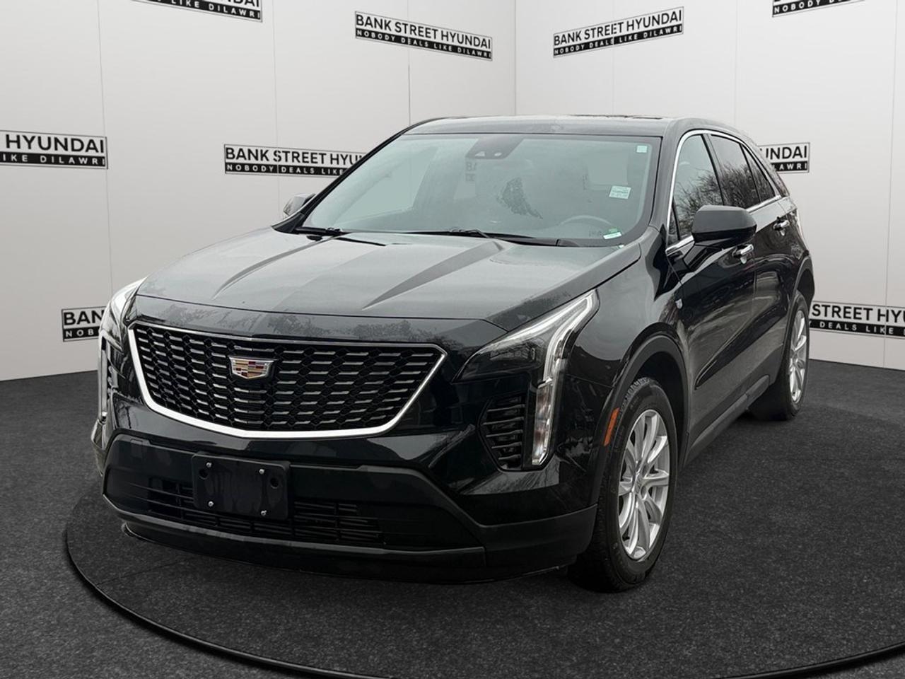 The 2023 Cadillac XT4 AWD 4dr Luxury is a striking SUV, wrapped in elegance with its gorgeous color and capable all-wheel-drive handling. This vehicle exudes confidence on any terrain, promising a driving experience thats as smooth as it is secure. Step outside and admire the sculpted lines and sophisticated alloy wheels that make this SUV a standout. Inside, youll find a cabin crafted for luxury and comfort, featuring heated seats for both front and rear passengers, ensuring everyone travels in style and warmth. The interior layout promotes easy access to its wealth of modern features like power seats and power windows, which enhance convenience for drivers and passengers alike. Embrace cutting-edge technology with smart device integration and a vibrant backup camera. The Cadillac XT4 doesnt compromise on safety either, equipped with advanced driver assistance systems such as lane assist and brake assist. Stay connected and entertained with satellite radio and a wi-fi hotspot, making every journey as enjoyable as the destination. If you value comfort, style, and technology in your vehicle, the 2023 Cadillac XT4 AWD Luxury is the perfect choice. This SUV is ideal for those who love to blend sophistication with practicality. Contact us today to get behind the wheel and experience it for yourself!