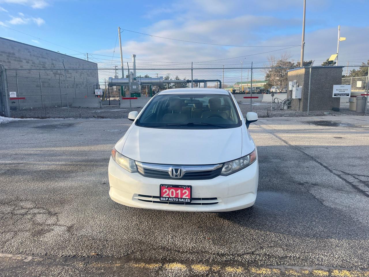 2012 Honda Civic 4dr Auto LX Photo