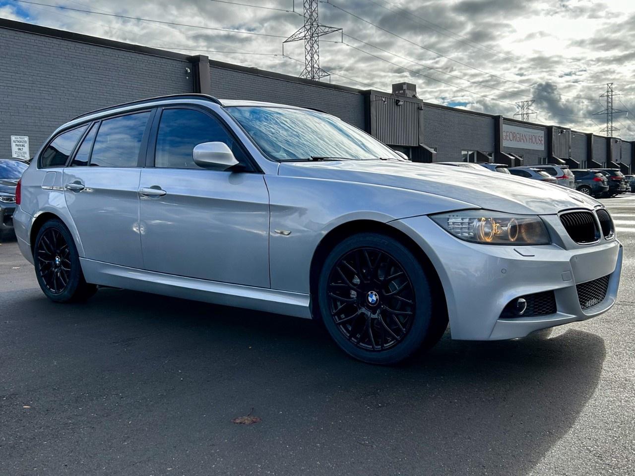 2011 BMW 3 Series 4dr Touring Wgn 328i xDrive AWD Exec Ed Photo