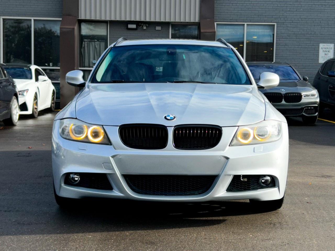 2011 BMW 3 Series 4dr Touring Wgn 328i xDrive AWD Exec Ed Photo