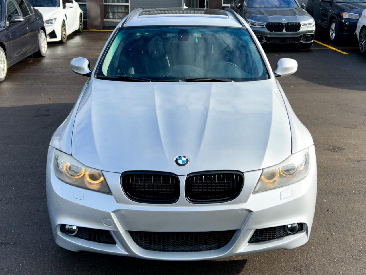 2011 BMW 3 Series 4dr Touring Wgn 328i xDrive AWD Exec Ed Photo