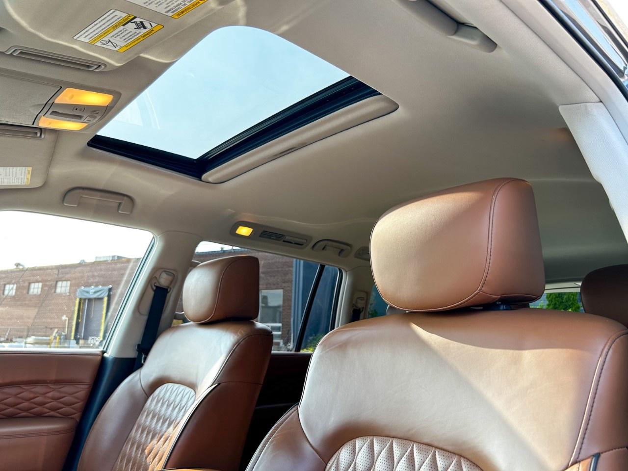 2018 Infiniti QX80 8 passenger / Rear TVs / No accident / 1 owner Photo