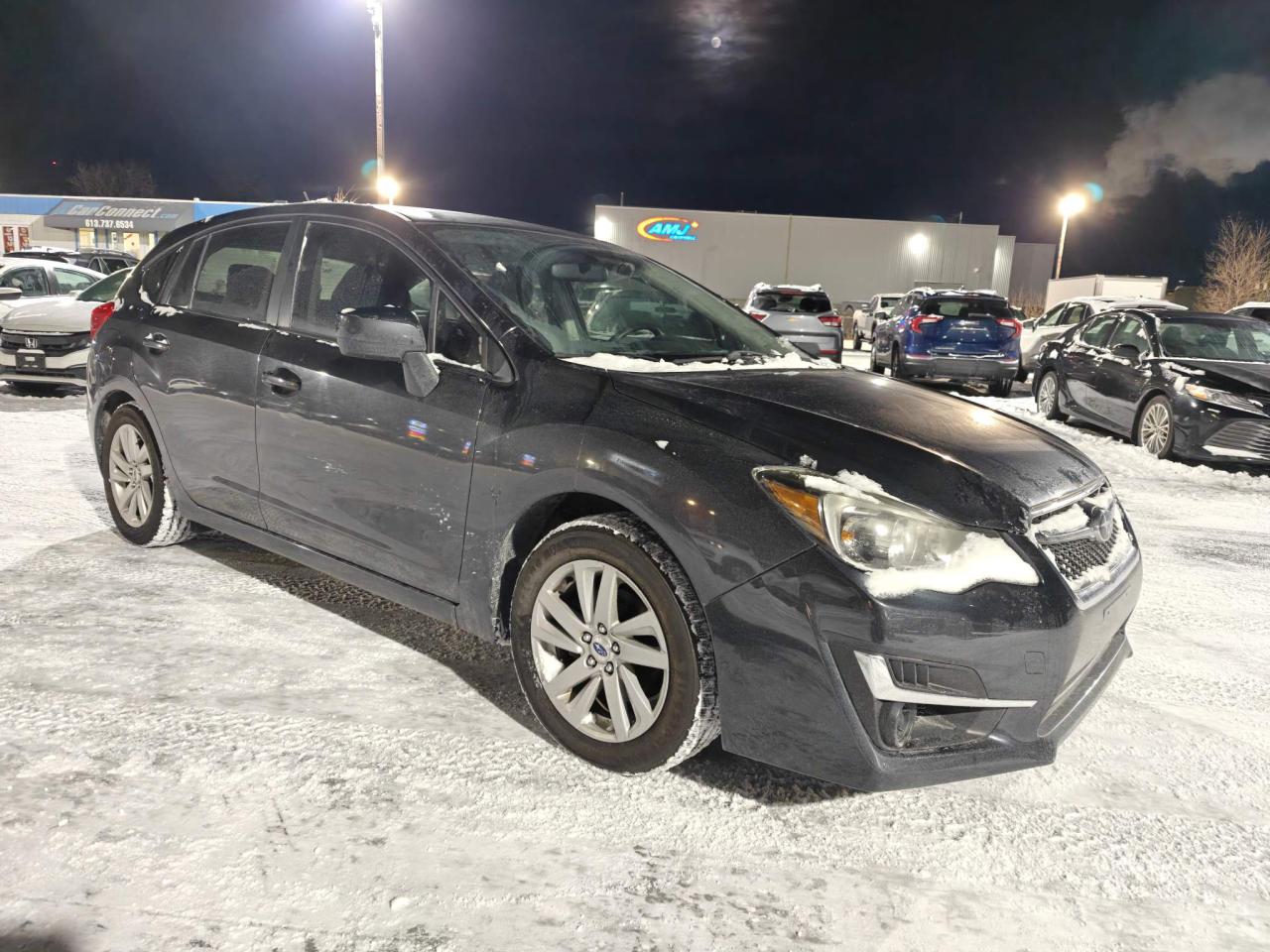 2016 Subaru Impreza 2.0i Touring Package (CVT) 4dr Hatchback Photo