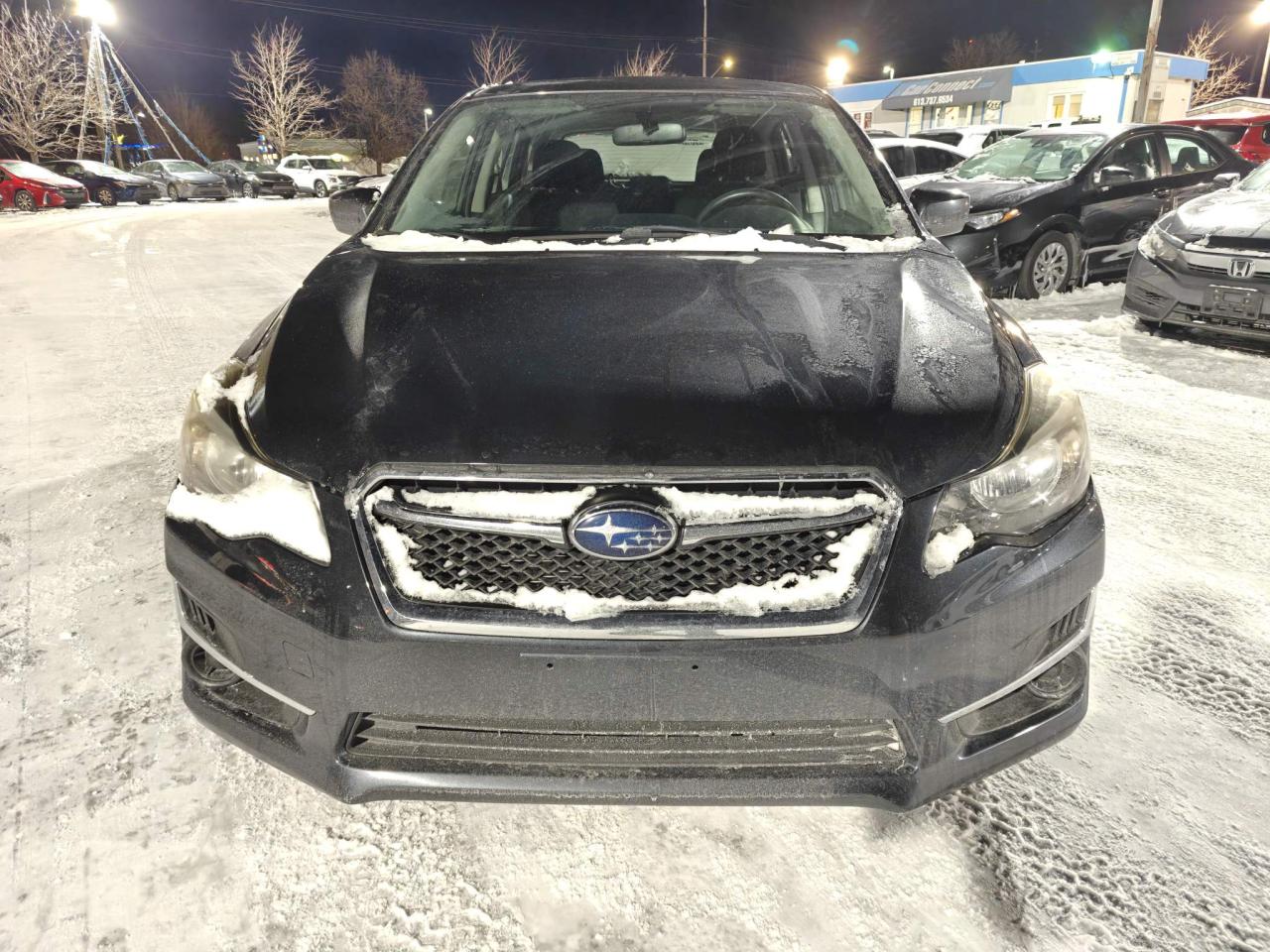 2016 Subaru Impreza 2.0i Touring Package (CVT) 4dr Hatchback Photo