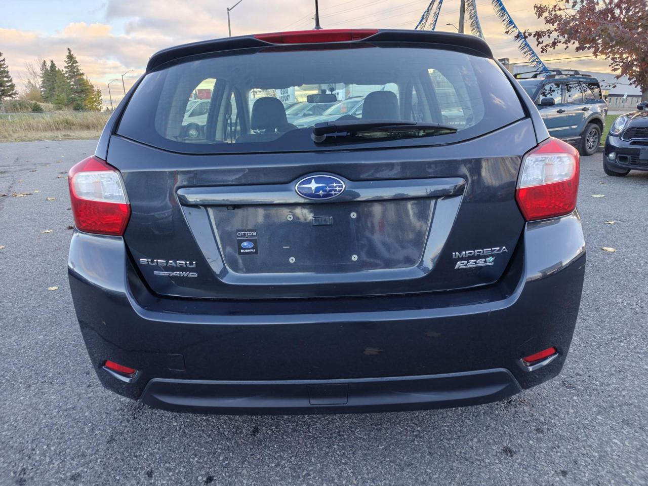 2016 Subaru Impreza 2.0i Touring Package (M5) 4dr Hatchback Photo2