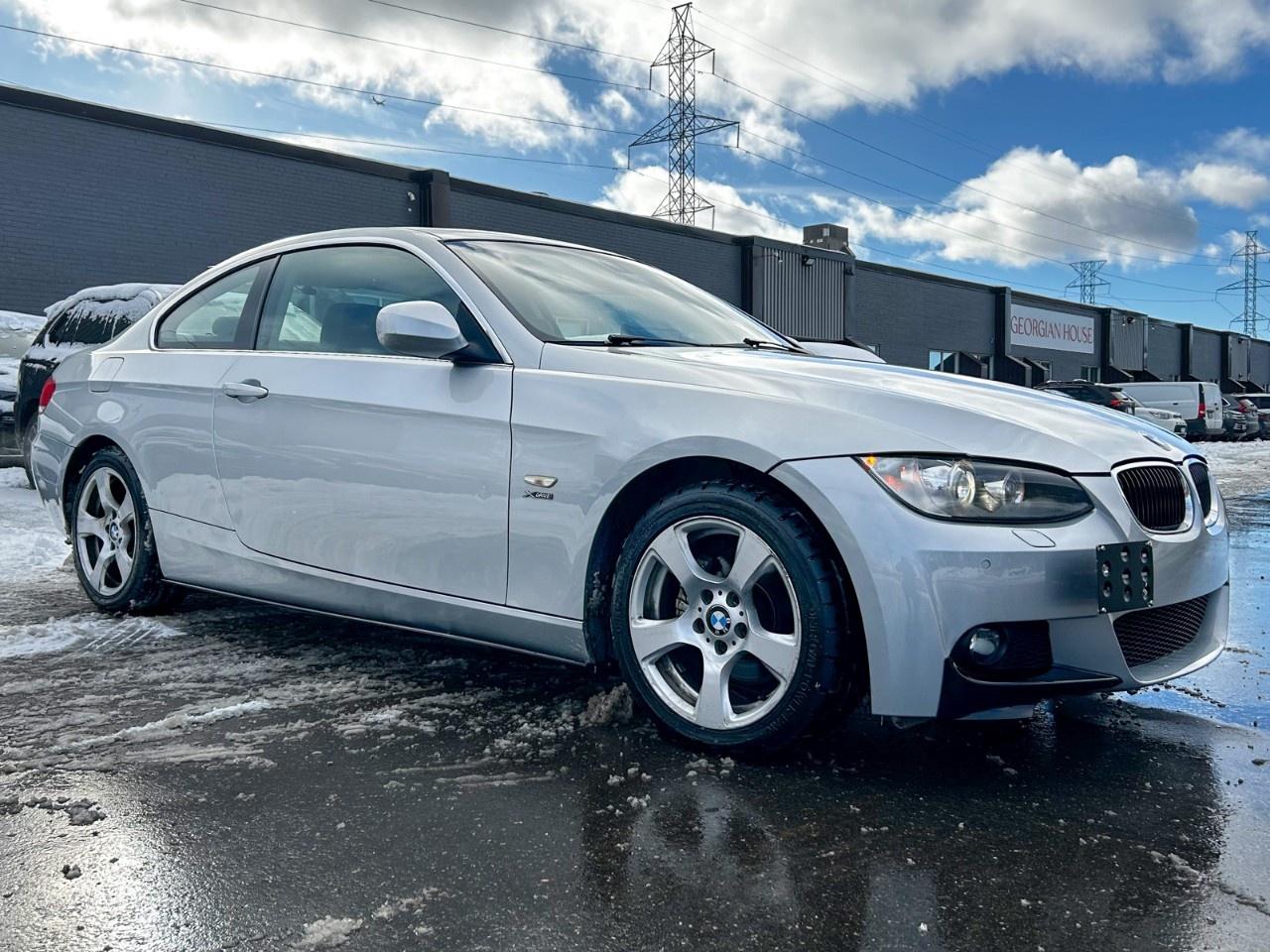 2010 BMW 3 Series 2dr Cpe 328i xDrive AWD Photo