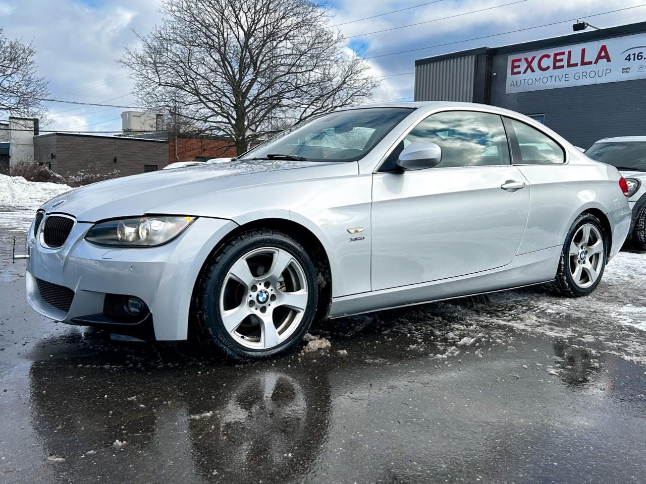 2010 BMW 3 Series 2dr Cpe 328i xDrive AWD Photo
