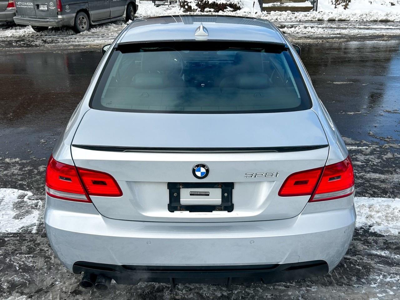 2010 BMW 3 Series 2dr Cpe 328i xDrive AWD Photo