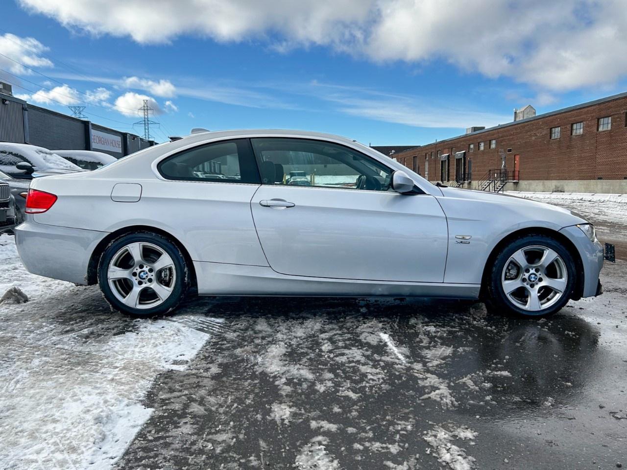 2010 BMW 3 Series 2dr Cpe 328i xDrive AWD Photo