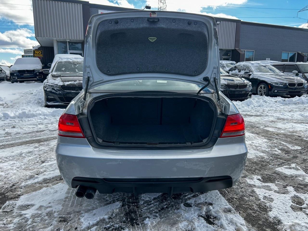 2010 BMW 3 Series 2dr Cpe 328i xDrive AWD Photo