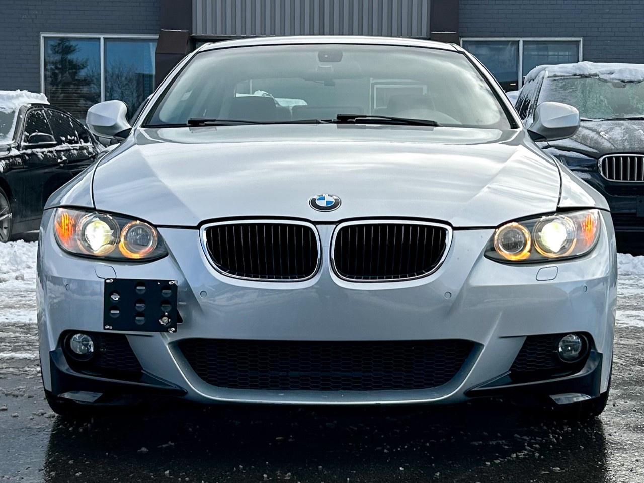 2010 BMW 3 Series Apple car play / Low Kilometers / Upgraded screen / Spoiler Photo