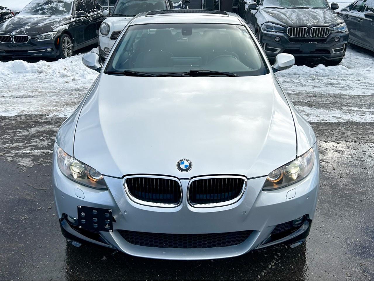 2010 BMW 3 Series Apple car play / Low Kilometers / Upgraded screen / Spoiler Photo