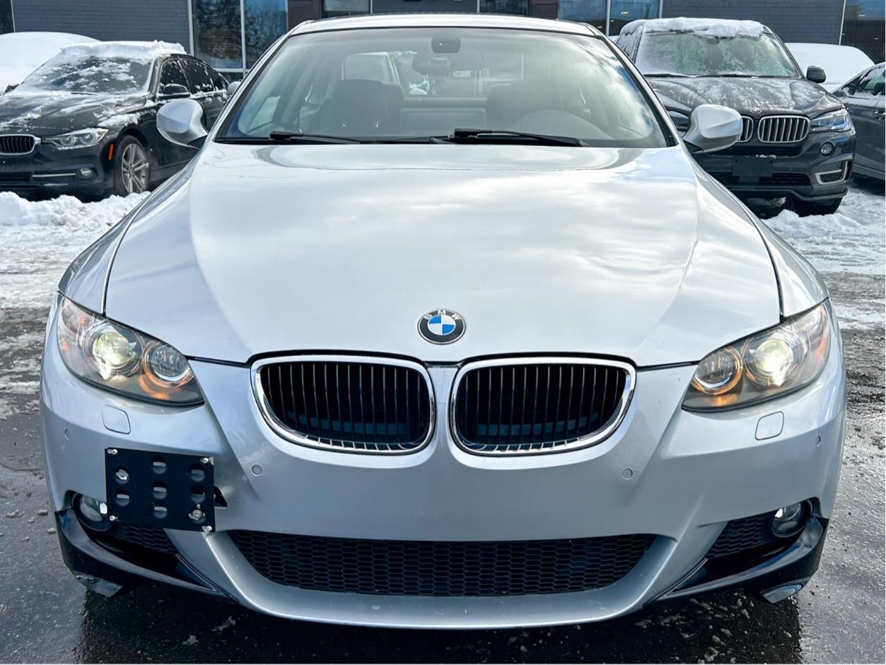 2010 BMW 3 Series Apple car play / Low Kilometers / Upgraded screen / Spoiler Photo