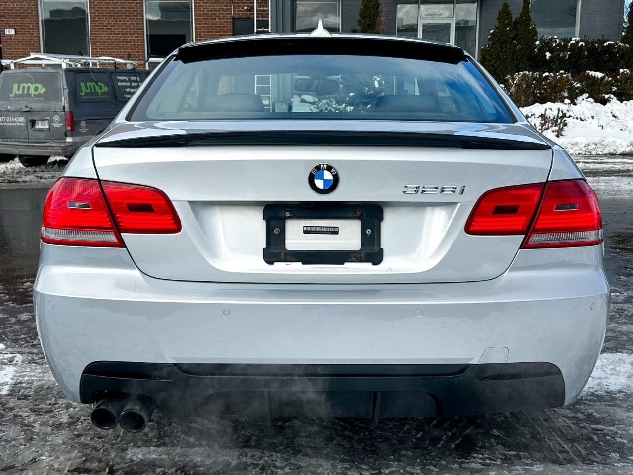2010 BMW 3 Series Apple car play / Low Kilometers / Upgraded screen / Spoiler Photo