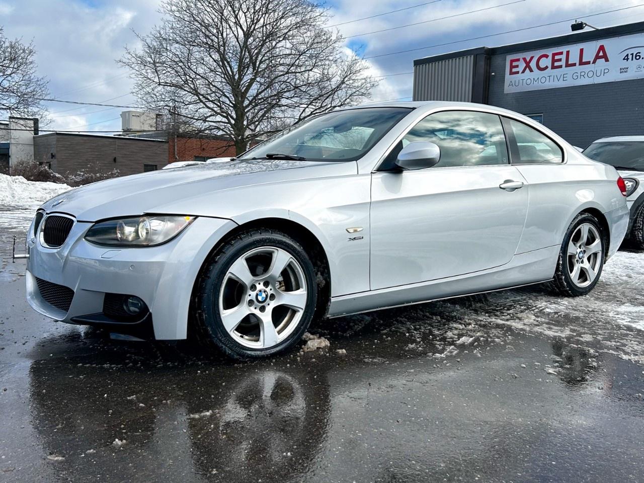 2010 BMW 3 Series Apple car play / Low Kilometers / Upgraded screen / Spoiler Photo