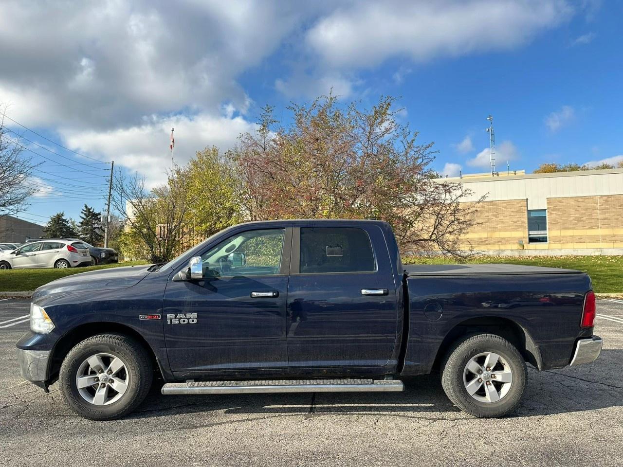 2015 RAM 1500 4WD Crew Cab 5.7 Ft Box Big Horn Photo