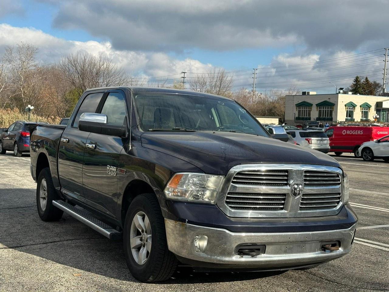 2015 RAM 1500 4WD Crew Cab 5.7 Ft Box Big Horn Photo