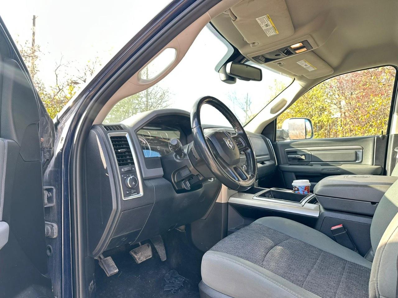 2015 RAM 1500 4WD Crew Cab 5.7 Ft Box Big Horn Photo