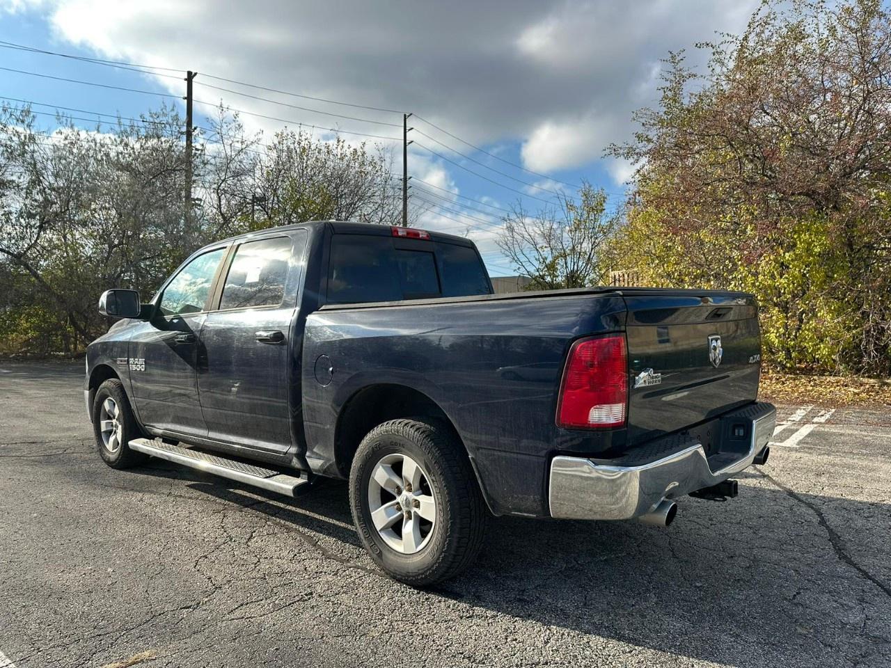 2015 RAM 1500 4WD Crew Cab 5.7 Ft Box Big Horn Photo