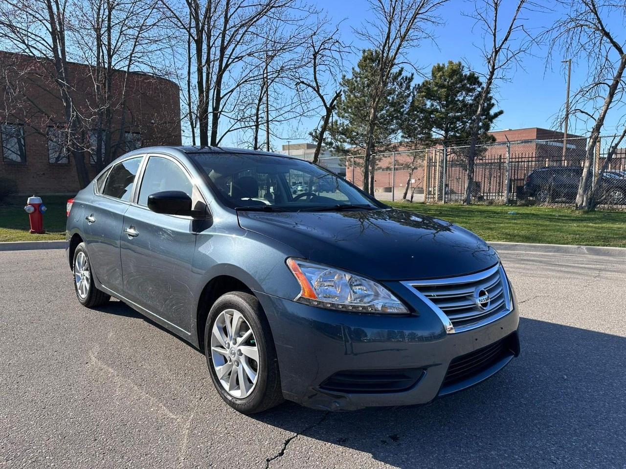 2015 Nissan Sentra 4DR SDN CVT SV Photo