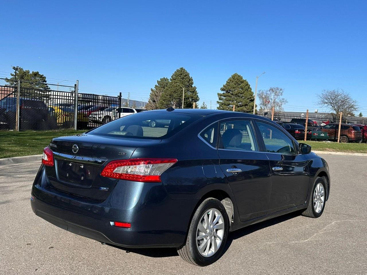 2015 Nissan Sentra 4DR SDN CVT SV Photo