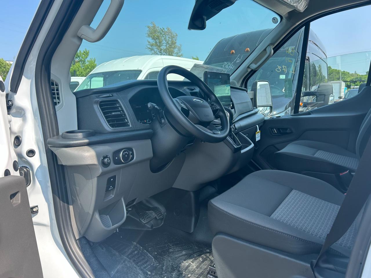 2025 Ford Transit-250 Cargo Base Rear-Wheel Drive Medium Roof Van 148 in. WB Photo