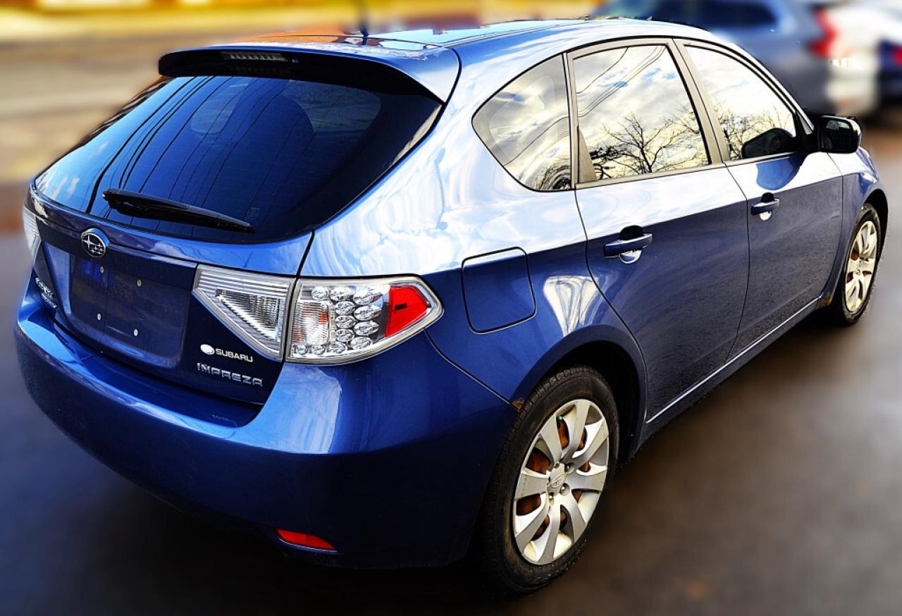 2011 Subaru Impreza 2.5i 4dr All-wheel Drive Sedan AUTOMATIC Photo
