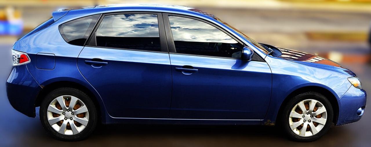 2011 Subaru Impreza 2.5i 4dr All-wheel Drive Sedan AUTOMATIC Photo