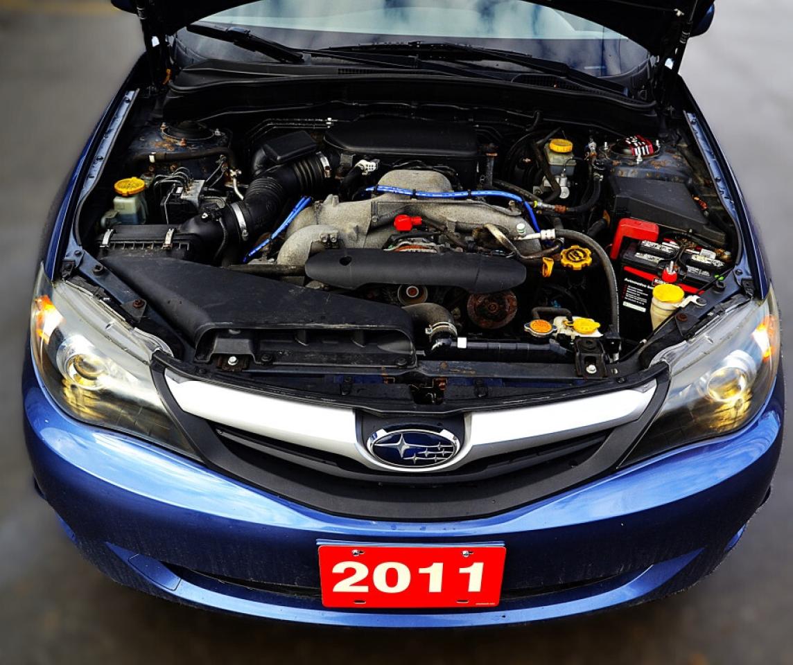 2011 Subaru Impreza 2.5i 4dr All-wheel Drive Sedan AUTOMATIC Photo