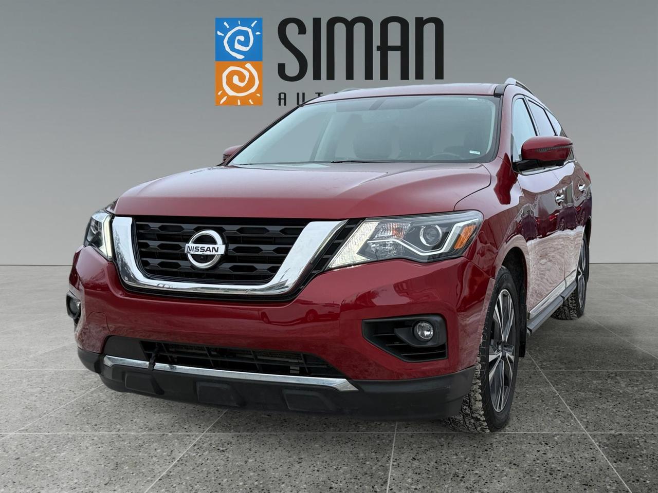## Experience Luxury and Capability: 2017 Nissan Pathfinder Platinum

Are you looking for the perfect family SUV that refuses to compromise on comfort or technology? At Siman Auto Sales, we are proud to present this exceptional 2017 Nissan Pathfinder Platinum. This is a local Saskatchewan vehicle that has been meticulously maintained, boasting excellent service records and just 118,000 km.

### Premium Comfort for Every Passenger

This Pathfinder is designed to keep everyone happy, whether you are commuting across town or heading out on a provincial road trip.

* **Elite Seating:** Enjoy 7-passenger capacity with power-adjustable leather memory seats that are both heated and cooled in the front.
* **Rear Passenger Luxury:** Your guests in the second row will stay cozy with their own heated seats.
* **Open Atmosphere:** The dual panoramic sunroof floods the cabin with natural light, making every seat the best seat in the house.
* **Entertainment on the Go:** Keep the kids engaged with the dual DVD screens built directly into the second row.

### Advanced Tech and Safety

Drive with total confidence and convenience thanks to a suite of high-end features.

* **Smart Navigation and Audio:** Stay on course with built-in Navigation and enjoy your favorite music via Bluetooth, CD, or SiriusXM radio.
* **Driver Assistance:** Navigate tight spots easily with the Surround View Camera and maintain a safe gap on the highway with Distance Pace Cruise Control.
* **Safety First:** Blind Spot Detection keeps an extra eye on the road for you.
* **Winter Ready:** Take the chill out of Saskatchewan winters with the heated steering wheel and factory Command Start.

### Why Choose Siman Auto Sales?

We have been serving Saskatchewan for over 27 years with a simple philosophy: we are large enough to make a difference and small enough to care. Our reputation matters to us, and we invite you to check our reviews to see how we treat our customers.

Buying your next vehicle should be stress-free. That is why we offer easy on-site financing through 16 different banks and lenders to ensure you get the best rate possible.

---

**Visit us today to see why this Pathfinder is the right fit for your family.**