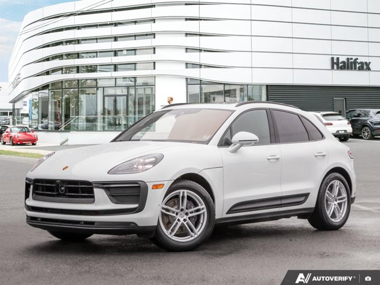*Now available at Porsche of Halifax*, this *2026 Porsche Macan* finished in *White* offers an excellent balance of sporty performance, premium comfort, and advanced technology. Paired with a *Standard Interior in Black*, this Macan is exceptionally well equipped, making it a versatile and refined choice for everyday driving in all seasons.==== Performance & Driving Dynamics ====  *   *PDK automatic transmission* delivering smooth, quick gear changes  *   *Adaptive Air Suspension with Porsche Active Suspension Management (PASM)* providing a comfortable ride with the ability to sharpen handling when desired  *   *Sport Chrono Package* enhancing responsiveness and drive-mode flexibility  *   *All-season tires on 19 wheels* for confident year-round driving==== Comfort & Convenience ====  *   *Power Seats (14-way) with Memory Package* for a personalized driving position  *   *Ventilated Front Seats* and *Heated Rear Seats* for all-season comfort  *   *Panoramic Roof System* creating a bright, open cabin feel  *   *Heated GT Sport Steering Wheel in Leather*  *   *Electric Steering Column* for effortless adjustment  *   *Heated Windshield* improving cold-weather visibility  *   *Ionizer* enhancing interior air quality  *   *Porsche Crest on Headrests (Front)* adding a premium finishing touch==== Technology & Driver Assistance ====  *   *Premium Package Plus* combining Porsches most sought-after comfort and technology features  *   *LED Headlights with Porsche Dynamic Light System Plus (PDLS+)* for excellent nighttime visibility  *   *Surround View Camera System* with *Self-Steering ParkAssist* for easy maneuvering and parking  *   *Lane Change Assist (LCA)* and *Lane Keep Assist with Traffic Jam Assist* for added confidence in traffic  *   *Preparation for Porsche Dashcam*  *   *Under-Door Puddle Light Projectors* providing a premium welcome==== Exterior Highlights ====  *   *Roof Rails in High Gloss Black* adding versatility and a clean, modern look  *   *Exclusive Design Fuel Cap*  *   Clean, athletic Macan styling with timeless White exterior finish----------------------------------------The *2026 Porsche Macan* in *White* is a beautifully configured example that delivers everyday comfort, advanced safety features, and the sporty driving feel Porsche is known for. Thoughtfully optioned and ready to be enjoyed, its an excellent choice for drivers seeking a premium compact SUV with true Porsche character.*Now at Porsche of Halifax* --- contact us today to schedule your private viewing or test drive.