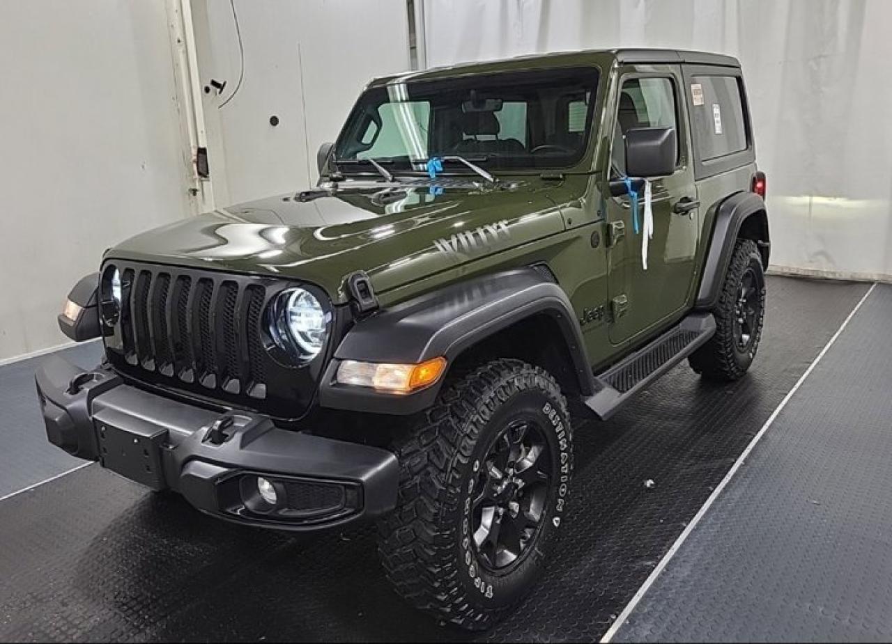 Look at this certified 2022 Jeep Wrangler Willys 4X4 | Heated Wheel + Seats | Remote Start | Nav | CarPlay + Android | Rear Camera | and More!. Its Automatic transmission and 2.0 L engine will keep you going. This Jeep Wrangler has the following options: Reverse Camera, Remote Start, Navigation System, Heated Steering Wheel, Air Conditioning, Heated Seats, Tilt Steering Wheel, Steering Radio Controls, Power Windows, and Power Locks. Stop by and visit us at Mark Wilsons Better Used Cars, 5055 Whitelaw Road, Guelph, ON N1H 6J4.60+ years of World Class Service!500+ Live Market Priced VEHICLES! ONE MASSIVE LOCATION!Free Local Delivery Available!FINANCING! - Better than bank rates! 6 Months No Payments available on approved credit OAC. Zero Down Available. We have expert licensed credit specialists to secure the best possible rate for you and keep you on budget ! We are your financing broker, let us do all the leg work on your behalf! Click the RED Apply for Financing button to the right to get started or drop in today!BAD CREDIT APPROVED HERE! - You dont need perfect credit to get a vehicle loan at Mark Wilsons Better Used Cars! We have a dedicated licensed team of credit rebuilding experts on hand to help you get the car of your dreams!WE LOVE TRADE-INS! - Top dollar trade-in values!SELL us your car even if you dont buy ours! HISTORY: Free Carfax report included.Certification included! No shady fees for safety!EXTENDED WARRANTY: Available30 DAY WARRANTY INCLUDED: 30 Days, or 3,000 km (mechanical items only). No Claim Limit (abuse not covered)5 Day Exchange Privilege! *(Some conditions apply)CASH PRICES SHOWN: Excluding HST and Licensing Fees.2021-2026 vehicles may be daily rentals. Please inquire with your Salesperson.