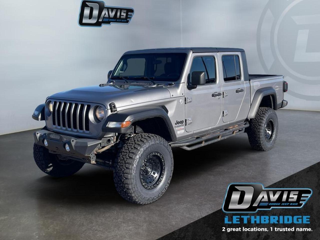 <b>Aluminum Wheels, Off-Road Suspension, Uconnect, Skid Plates, Streaming Audio!</b><br /> <br /> Ever wished your truck had a big open cabin like a Jeep? Ever wished your Jeep could hold more than a few people and a backpack? Now it can thanks to this awesome Jeep Gladiator! This 2020 Jeep Gladiator is fresh on our lot in Lethbridge. <br /> <br />Built with unmistakable Jeep styling and off-road capability, while bringing the utility and hauling power of a pickup truck, you get the best of both worlds with this incredible machine. Thanks to its unmistakable style, rugged off-road technology, and an exhilarating open air truck experience, this unique Jeep Gladiator is ready to change the 4X4 game. This Regular Cab 4X4 pickup has 122,151 km. Stock number 41020 is Silver in colour. It has an Automatic transmission and is powered by a 285HP 3.6L V6 Cylinder Engine. <br /> <br /> Our Gladiator's trim level is Sport S. The first Jeep truck in a long time, this all new Gladiator was made for those long trails with the only removable cabin panels for an open air trucking experience in the segment. It also comes with aluminum wheels, skid plates, class II towing equipment, two front tow hooks and one rear, blacked out exterior trim, a smart key with push button start, locking interior compartments, Uconnect 3 with a 5 inch display, Bluetooth streaming audio, voice activation, a brake actuated limited slip differential and multiple inputs. This vehicle has been upgraded with the following features: Aluminum Wheels, Off-Road Suspension, Uconnect, Skid Plates, Streaming Audio, Rear Camera, Proximity Key.<br /> <br />To apply right now for financing use this link: <a href=https://www.bridgecitychrysler.com/pre-approval/ target=_blank rel=nofollow noopener noreferrer>https://www.bridgecitychrysler.com/pre-approval/</a><br /><br /> <br /><br />Locally Owned & Trusted for Over 35 Years  Bridge City Chrysler in Lethbridge, AB <br /><br /> At Bridge City Chrysler, weve proudly served the Lethbridge community for more than 35 years, offering an unparalleled car buying experience. Dont just take our word for itour Google reviews speak volumes about our commitment to exceptional service. <br /><br /> Delivery & At-Home Test Drives: Convenient options to suit your lifestyle. <br /><br /> Flexible Financing for Everyone: Get the vehicle you need with financing solutions tailored to your situation. <br /><br /> Full Mechanical Inspections & Professional Cleaning: Every vehicle is thoroughly inspected and cleaned before it hits our lot.<br /><br /> We take all makes and models on trade and offer competitive pricing with inventory that changes daily. Whether you're shopping for a Chrysler, Dodge, Jeep, RAM, or FIAT, our AMVIC Licensed dealership makes it easy to browse, buy, and drive away.<br /><br /> Located in Lethbridge, AB, we proudly serve customers in Fort Macleod, Taber, Claresholm, and Coaldale. Shop online or visit us today to experience the best in sales, service, and selection. Standard bank rates apply; taxes are additional.<br /><br /> Vehicle pricing offer shown expires 2026-01-31. <br /> Come by and check out our fleet of 80+ used cars and trucks and 130+ new cars and trucks for sale in Lethbridge. o~o