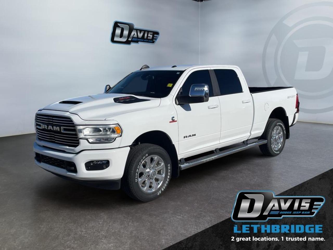 <b>Heavy Duty Suspension, Heated Steering Wheel, Tow Package, Navigation, Apple CarPlay!</b><br /> <br /> Whether you're on the job site, driving around town, or making a long-haul trip, this Ram 2500 HD gets the job done with ease. This 2023 Ram 2500 is fresh on our lot in Lethbridge. <br /> <br />Endlessly capable, this 2023 Ram 2500HD pulls out all the stops, and has the towing capacity that sets it apart from the competition. On top of its proven Ram toughness, this Ram 2500HD has an ultra-quiet cabin full of amazing tech features that help make your workday more enjoyable. Whether you're in the commercial sector or looking for serious recreational towing rig, this impressive 2500HD is ready for anything that you are. This sought after diesel Crew Cab 4X4 pickup has 46,656 km. Stock number 41016 is White in colour. It has an Automatic transmission and is powered by a Cummins 370HP 6.7L Straight 6 Cylinder Engine. <br /> <br /> Our 2500's trim level is Laramie. This incredible Ram 2500 Laramie comes well equipped with class V towing equipment including a hitch, brake controller and trailer sway control, heavy duty suspension, heated and power adjustable side mirrors, front and reverse utility lights, cargo box lighting, and a rear step bumper. On the inside, occupants are treated to heated and power-adjustable front seats with lumbar support, leather upholstery, dual-zone front automatic air conditioning, a leather-wrapped steering wheel, and illuminated front cupholders. Stay connected on the road via an 8.4-inch display powered by Uconnect 5 with GPS navigation, HD radio, Apple CarPlay and Android Auto, Alexa Built-In, SiriusXM streaming radio, trailer tow pages, off-road info pages, and mobile hotspot internet access. Additional features include a 10-speaker Alpine audio system, 115-volt rear auxiliary power outlet, remote engine start, and even more! This vehicle has been upgraded with the following features: Heavy Duty Suspension, Heated Steering Wheel, Tow Package, Navigation, Apple CarPlay, Android Auto, Heated Seats.<br /> <br />To apply right now for financing use this link: <a href=https://www.bridgecitychrysler.com/pre-approval/ target=_blank rel=nofollow noopener noreferrer>https://www.bridgecitychrysler.com/pre-approval/</a><br /><br /> <br /><br />Locally Owned & Trusted for Over 35 Years  Bridge City Chrysler in Lethbridge, AB <br /><br /> At Bridge City Chrysler, weve proudly served the Lethbridge community for more than 35 years, offering an unparalleled car buying experience. Dont just take our word for itour Google reviews speak volumes about our commitment to exceptional service. <br /><br /> Delivery & At-Home Test Drives: Convenient options to suit your lifestyle. <br /><br /> Flexible Financing for Everyone: Get the vehicle you need with financing solutions tailored to your situation. <br /><br /> Full Mechanical Inspections & Professional Cleaning: Every vehicle is thoroughly inspected and cleaned before it hits our lot.<br /><br /> We take all makes and models on trade and offer competitive pricing with inventory that changes daily. Whether you're shopping for a Chrysler, Dodge, Jeep, RAM, or FIAT, our AMVIC Licensed dealership makes it easy to browse, buy, and drive away.<br /><br /> Located in Lethbridge, AB, we proudly serve customers in Fort Macleod, Taber, Claresholm, and Coaldale. Shop online or visit us today to experience the best in sales, service, and selection. Standard bank rates apply; taxes are additional.<br /><br /> Vehicle pricing offer shown expires 2026-01-31. <br /> Come by and check out our fleet of 80+ used cars and trucks and 130+ new cars and trucks for sale in Lethbridge. o~o