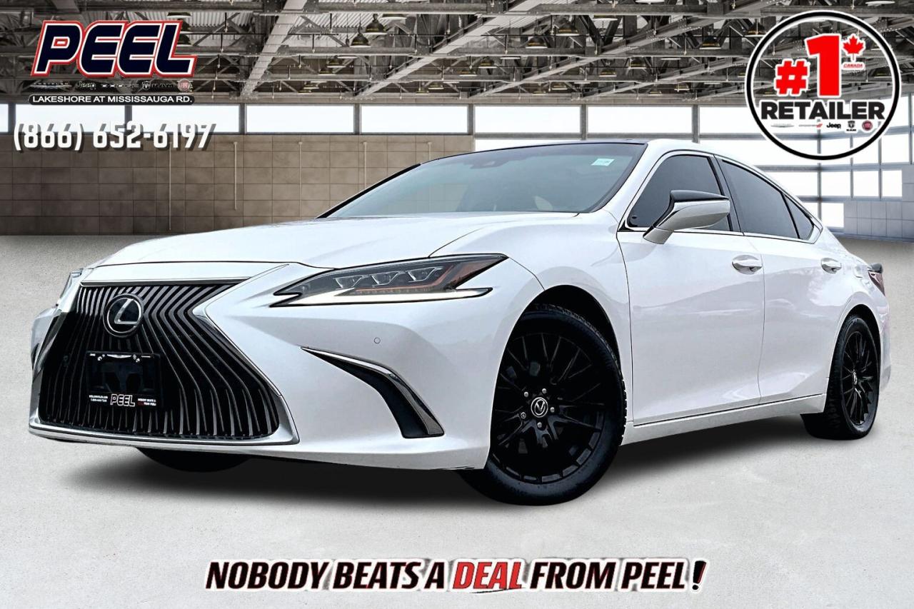 COME SEE WHY NOBODY BEATS A DEAL FROM PEEL! Your Source for ALL make and models used cars and trucks. The True #1 Stellantis Retailer in Ontario for 14 years and running!! (*)

2019 Lexus ES 350 FWD | Heated & Ventilated Leather Seats | Touchscreen Display w/ Navigation | Dual-pane Panoramic Sunroof | Bridgestone Blizzak Winter Tires on 17" Gloss Black Alloy Wheels | All Season Tires on Alloy Wheels (No Extra Charge, may not be road-worthy. As Is)

Clean Carfax
______________________________________________________

Engage & Explore with Peel Chrysler: Whether youre inquiring about our latest offers or seeking guidance, 1-866-652-6197 connects you directly. Dive deeper online or connect with our team to navigate your automotive journey seamlessly.

WE TAKE ALL TRADES & CREDIT. WE SHIP ANYWHERE IN CANADA! OUR TEAM IS READY TO SERVE YOU 7 DAYS!
______________________________________________________
Our advertised prices are for consumers (i.e end users) only. 

*FREE CarFax (click the link above to check it out at no cost to you!)*

*FULLY CERTIFIED! (Have you seen some of these other dealers stating in their advertisements that certification is an additional fee? NOT HERE! Our certification is already included in our low sale prices to save you more!)

(*) Based on the Eastern Business Center National Ranking reported sales to actual customers, not including demonstrators.
______________________________________________________

Peel Chrysler  A Trusted Destination: Based in Port Credit, Ontario, we proudly serve customers from all corners of Ontario and Canada including Toronto, Oakville, North York, Richmond Hill, Ajax, Hamilton, Niagara Falls, Brampton, Thornhill, Scarborough, Vaughan, London, Windsor, Cambridge, Kitchener, Waterloo, Brantford, Sarnia, Pickering, Huntsville, Milton, Woodbridge, Maple, Aurora, Newmarket, Orangeville, Georgetown, Stouffville, Markham, North Bay, Sudbury, Barrie, Sault Ste. Marie, Parry Sound, Bracebridge, Gravenhurst, Oshawa, Ajax, Kingston, Innisfil and surrounding areas. On our website www.peelchrysler.com, you will find a vast selection of new vehicles including the new and used Ram 1500, 2500 and 3500. Chrysler Grand Caravan, Chrysler Pacifica, Jeep Cherokee, Wrangler and more. All vehicles are priced to sell. We deliver throughout Canada. website or call us 1-866-652-6197. 

Disclaimer Statement: At Peel Chrysler, your satisfaction is our priority. While many pre-owned vehicles originally come with two keys, variations may occur based on trade-ins, and all Peel Chrysler Pre-Owned Vehicles come standard with one key. Any extras provided by the previous owner will be included with your purchase, and additional keys can be bought at the time of sale. Online prices and payments are for finance purchases. Used vehicles that are being financed are subject to a $499 (^$1500 non-prime) financing fee, while cash purchases (certified cheque, bank draft, or wire transfer) on used vehicles have a $2,000 surcharge ( online price + $2,000). Cash purchases of new vehicles only incur applicable taxes and licensing fees, and those priced above $100,000 (including accessories or add-ons) are subject to a federal luxury tax. Optional finance and lease terms are available, and if trading in a vehicle with an outstanding loan balance requiring Peel Chrysler to facilitate the lien payout, a Lien Payout Fee of $349 applies. Prices, rates, and payments are subject to change without notice. While we strive for accuracy, occasional technical or human errors may occur, so we encourage verifying all vehicle details, including features, options, materials, and specifications, with a Peel Chrysler representative by contacting us or visiting our dealership. Experience seamless convenience with our nationwide delivery options. Visit our website or contact us for more details.