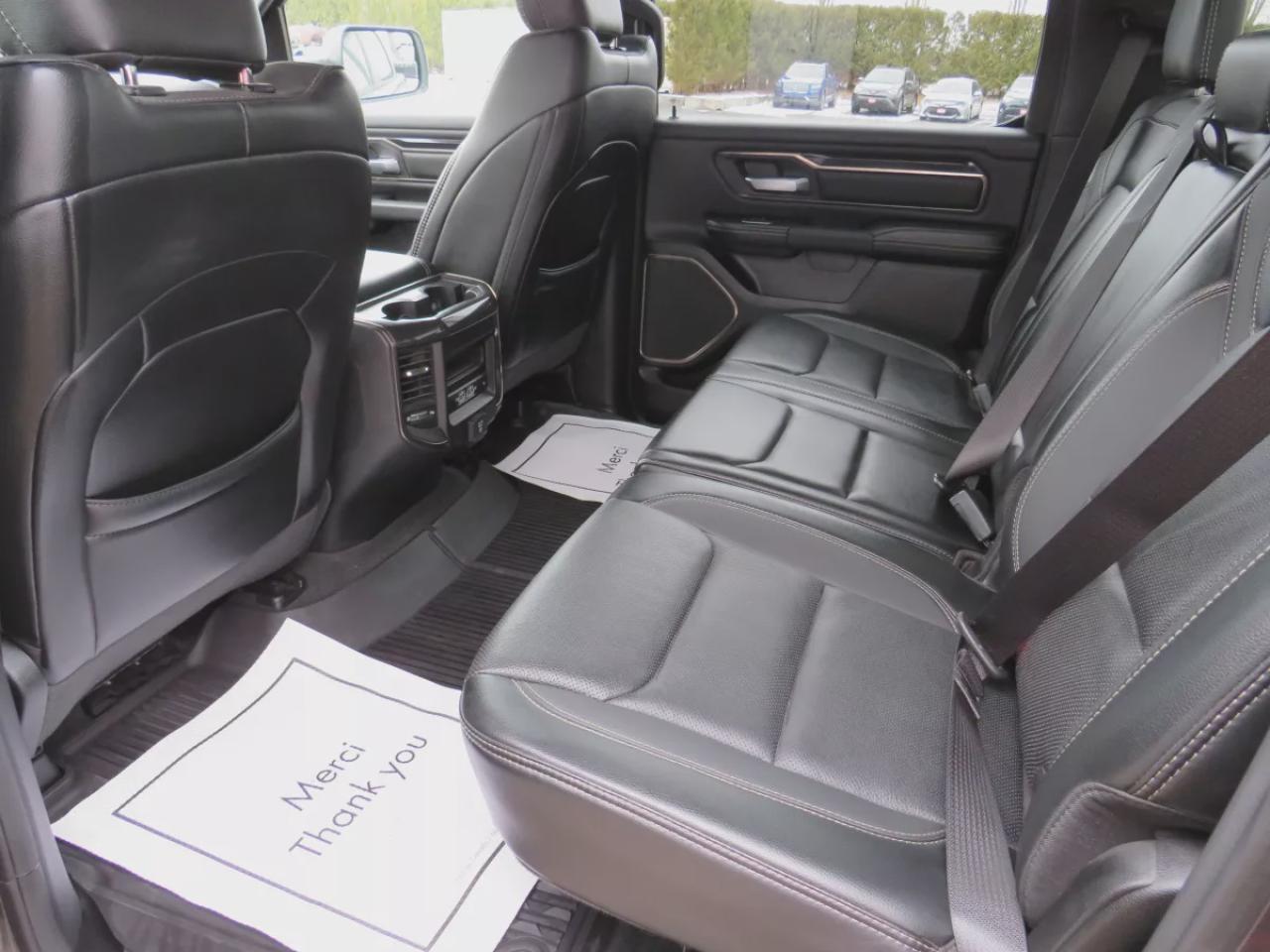 2022 RAM 1500 Rebel (**SAFETY/CERTIFIED!!**4WD**RUNNING BOARDS**TRAILER HITCH**TONNEAU COVER**REMOTE START**BRAKE CONTROLLER**FRONT TOW HOOKS**NAVIGATION**FOG LIGHTS**WIRELESS PHONE CHARGING**HEATED FRONT AND REAR SEATS**REVERSE CAMERA**LEATHER**SUNROOF**PUSH BUTTON ST Photo