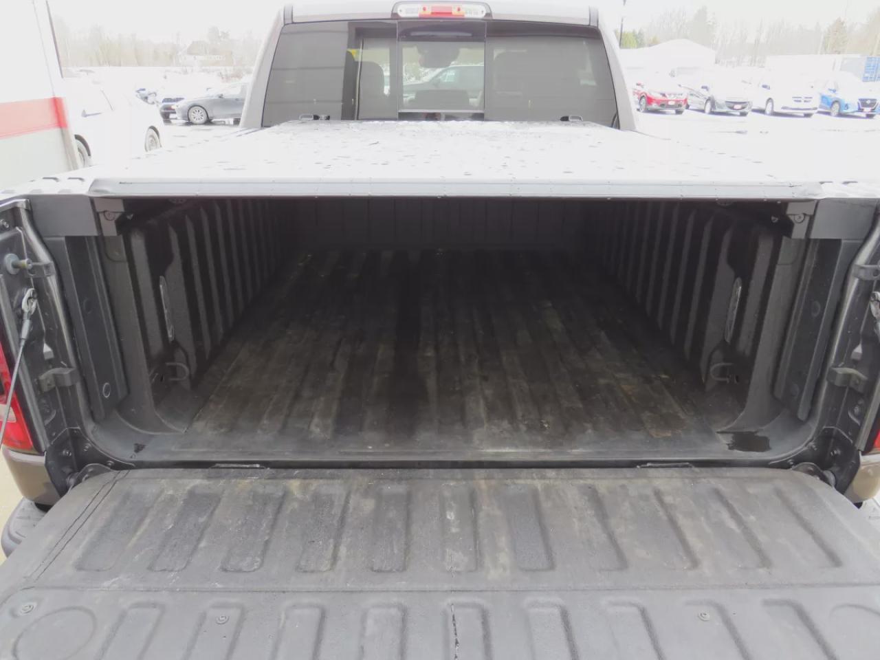 2022 RAM 1500 Rebel (**SAFETY/CERTIFIED!!**4WD**RUNNING BOARDS**TRAILER HITCH**TONNEAU COVER**REMOTE START**BRAKE CONTROLLER**FRONT TOW HOOKS**NAVIGATION**FOG LIGHTS**WIRELESS PHONE CHARGING**HEATED FRONT AND REAR SEATS**REVERSE CAMERA**LEATHER**SUNROOF**PUSH BUTTON ST Photo