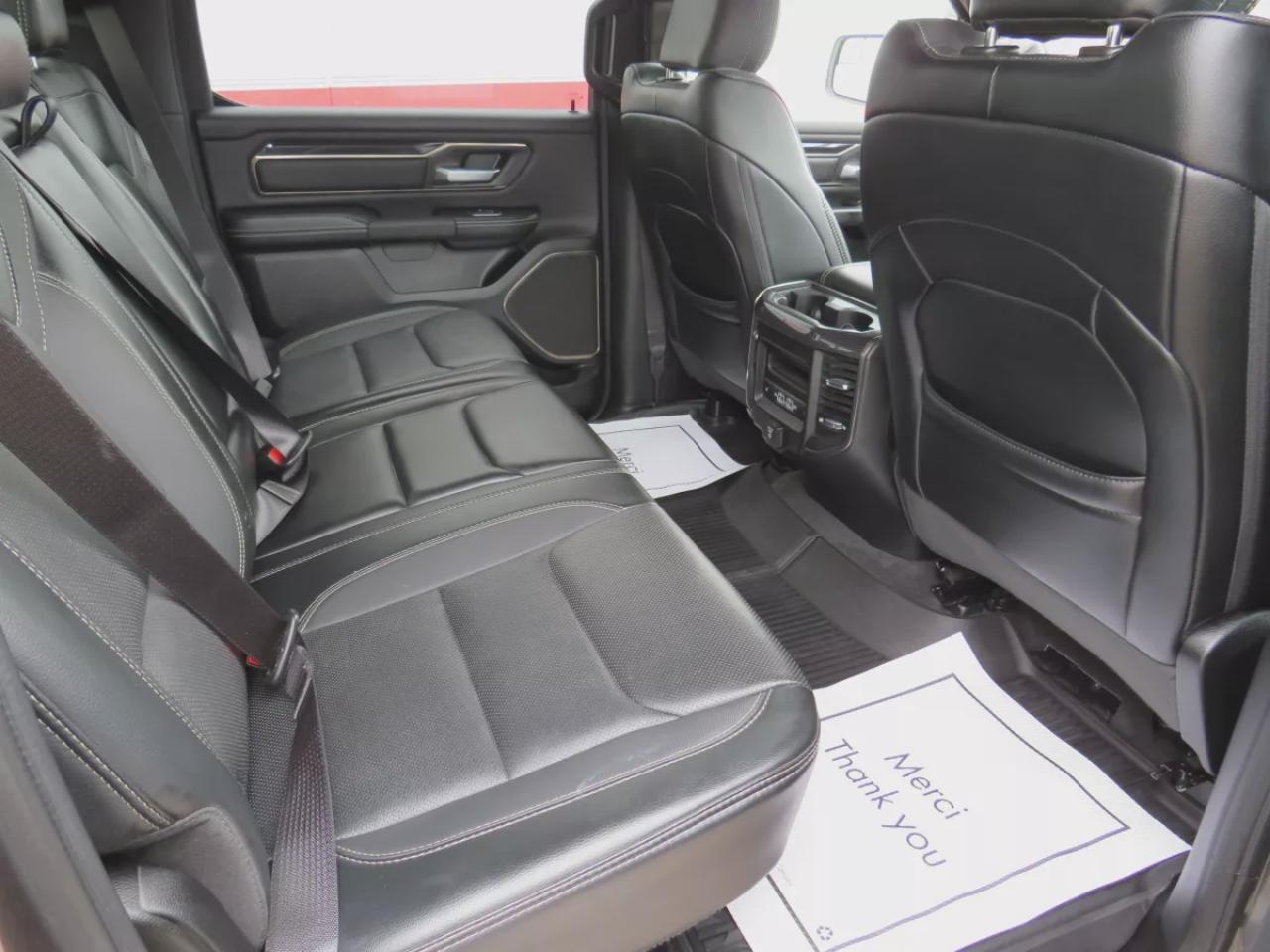 2022 RAM 1500 Rebel (**SAFETY/CERTIFIED!!**4WD**RUNNING BOARDS**TRAILER HITCH**TONNEAU COVER**REMOTE START**BRAKE CONTROLLER**FRONT TOW HOOKS**NAVIGATION**FOG LIGHTS**WIRELESS PHONE CHARGING**HEATED FRONT AND REAR SEATS**REVERSE CAMERA**LEATHER**SUNROOF**PUSH BUTTON ST Photo