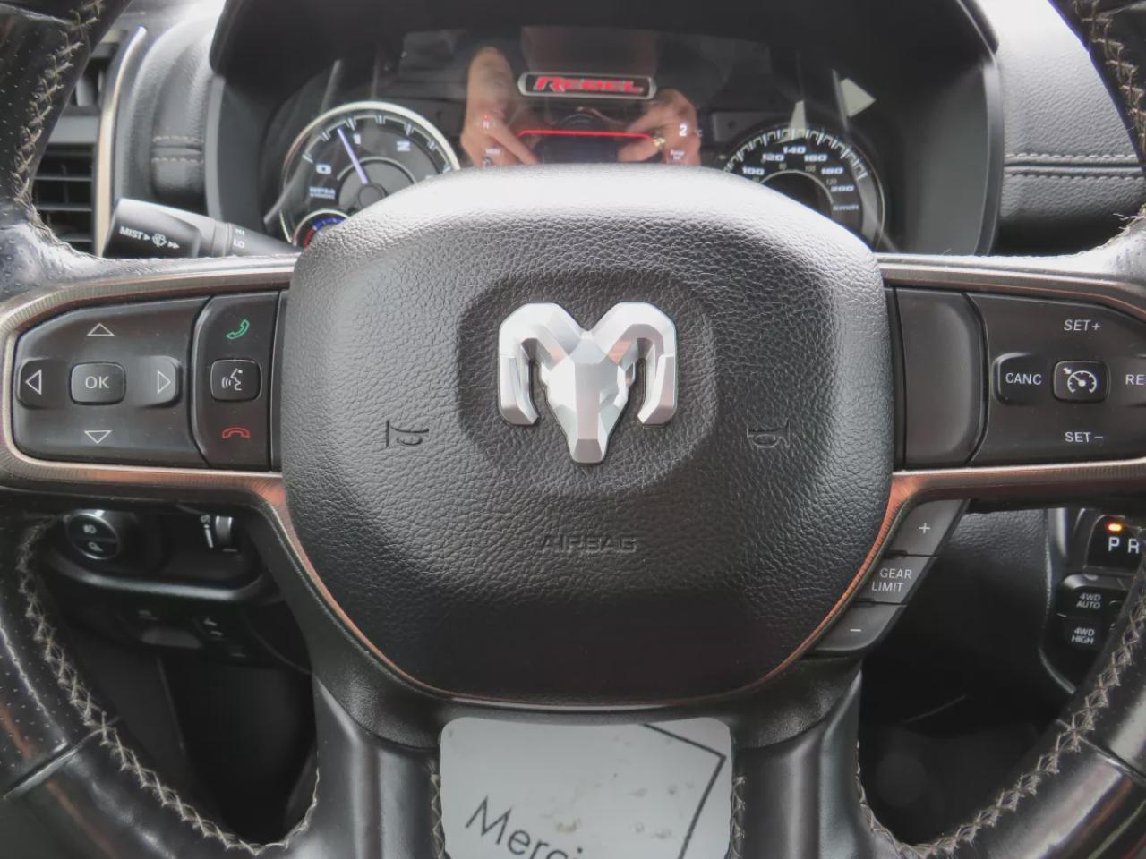 2022 RAM 1500 Rebel (**SAFETY/CERTIFIED!!**4WD**RUNNING BOARDS**TRAILER HITCH**TONNEAU COVER**REMOTE START**BRAKE CONTROLLER**FRONT TOW HOOKS**NAVIGATION**FOG LIGHTS**WIRELESS PHONE CHARGING**HEATED FRONT AND REAR SEATS**REVERSE CAMERA**LEATHER**SUNROOF**PUSH BUTTON ST Photo